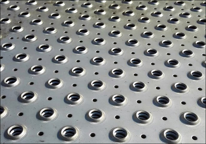 Perforated steel grating dimple pattern for truck flooring